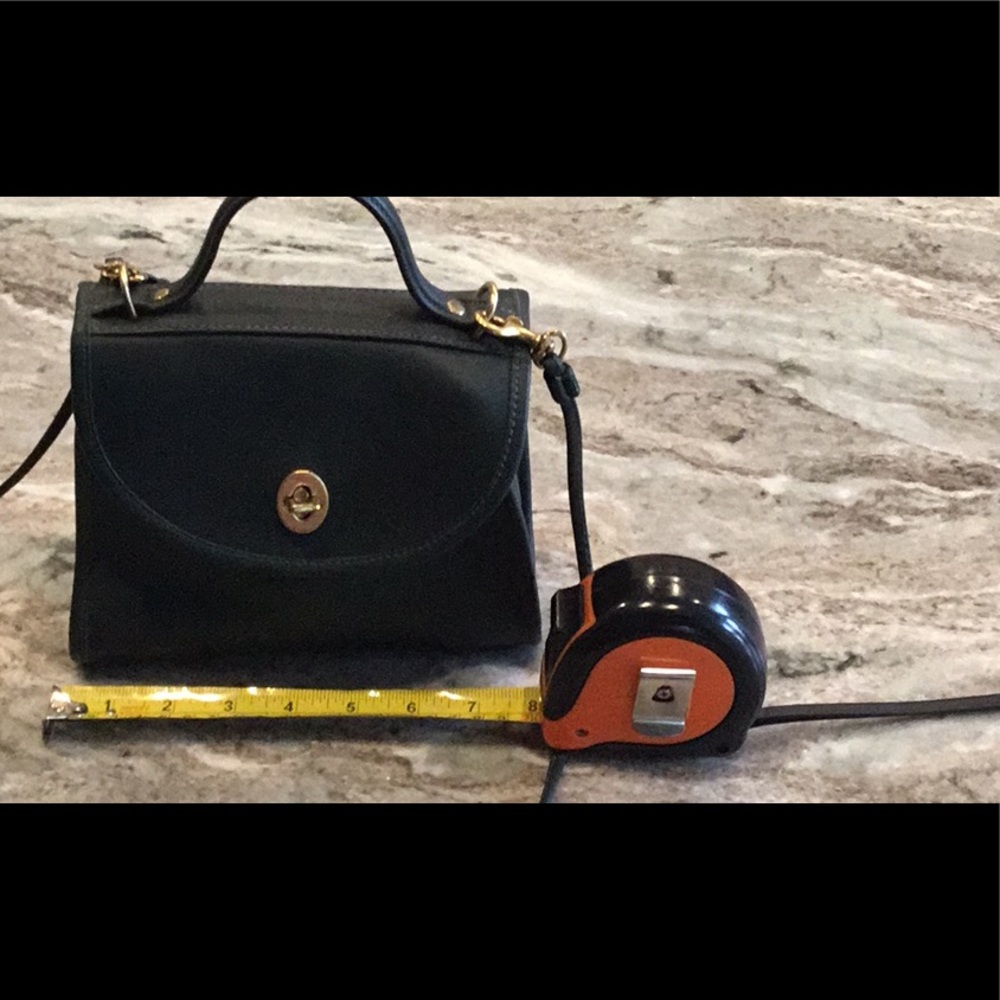 Coach small top handle vintage bag in dark green. Excellent condition.